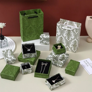 Elegant vintage forest green jewelry box set with gold floral patterns and gift bag