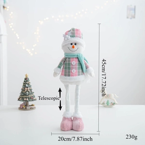 Detail of pink and green telescopic snowman doll showing 45cm height and measurements