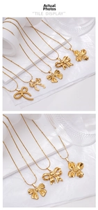 Detailed tile display of gold bow pendants and sun flower necklace with ball chain