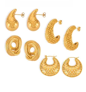 Detailed set of four gold-plated oval and geometric hoop earrings with textured patterns
