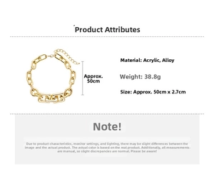 Detail view of chunky gold-tone acrylic and alloy chain necklace showing dimensions and weight