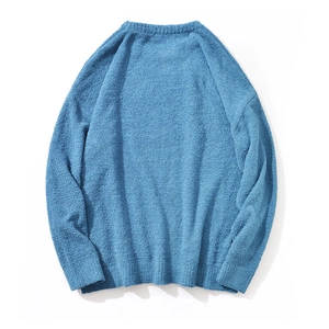 Close-up of blue chenille knit fabric texture showing high-quality plush material detail