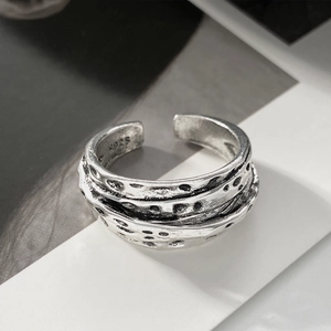 Detailed macro view of S925 hallmark on minimalist vintage silver thorn heart ring