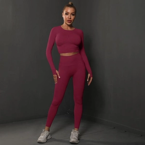 Deep burgundy seamless yoga set with long sleeve crop top and high waist leggings