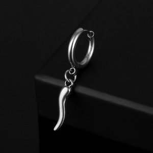 Silver stainless steel huggie earring with polished Italian horn pendant on a black surface