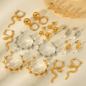 Collection of vacuum plated gold stainless steel earrings with pearl and snake designs