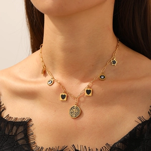 Vintage gold-plated stainless steel necklace with black enamel square and coin charms
