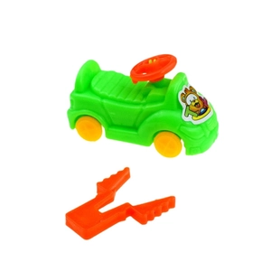 Detail of colorful plastic toy car with catapult clip showing bright green finish