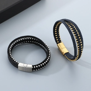 Detail of multi-layer woven leather bracelet with stainless steel magnetic clasp for men