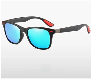 Detail of polarized sunglasses with blue mirrored lenses and red anti-slip rubber pads