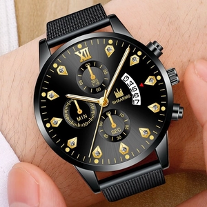 Montre homme business à quartz noir et doré avec chiffres romains et bracelet maille