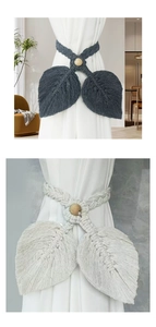 Detailed view of handmade macrame leaf curtain tiebacks in charcoal and beige tones
