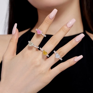 Close-up of S925 sterling silver rings with colorful heart-shaped 8A cubic zirconia stones