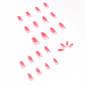 Pink gradient long oval press-on nails set with natural blush effect on white background