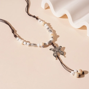 Ethnic layered long sweater necklace with ceramic beads and silver butterfly pendant