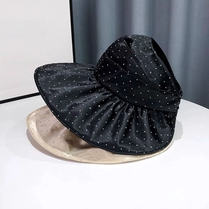 Women's rhinestone sun visor hat with wide brim in black and champagne gold satin