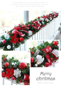 Detail of 270cm Christmas PVC garland with frosted ornaments and red bows for decor