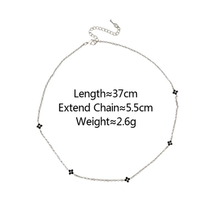 Detail view of four-leaf clover necklace with length and weight specifications