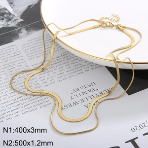 Double-layered 18k gold plated flat snake chain necklace on minimalist display