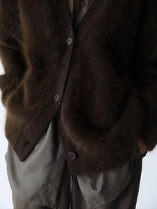 Relaxed fit dark brown faux mink cardigan with long sleeves and button-up front detail