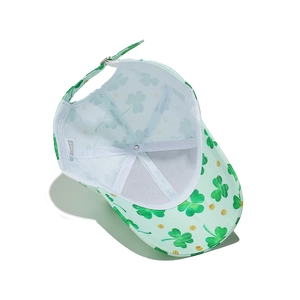Detail view of St. Patrick’s Day baseball cap showing inner polyester lining and shamrock print
