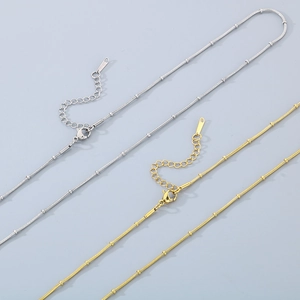 Adjustable stainless steel snake chain necklace with beads in gold and silver finish