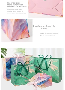Detail of marble pattern gift bags with silk bows and reinforced folding bottom