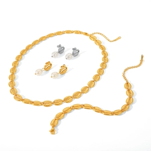 Golden seashell jewelry set with stainless steel shell necklace, bracelet, and pearl earrings