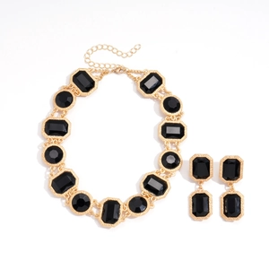 Parure de bijoux vintage dorée avec cristaux noirs géométriques pour femme