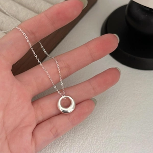 Minimalist 925 sterling silver circle pendant necklace with polished finish for women