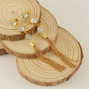 Boucles d'oreilles longues à pampilles en acier doré 18K avec cristaux de zircone