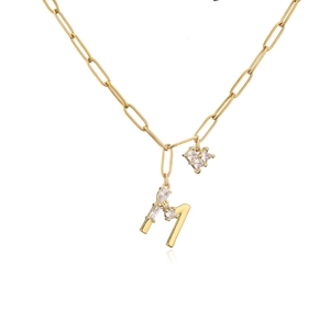 Gold paperclip chain necklace with a zircon heart and letter M star pendant charm