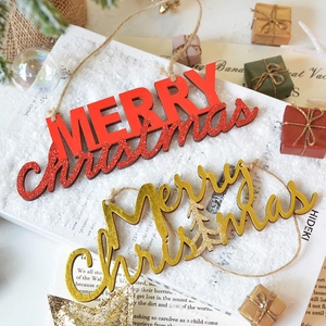 Merry Christmas wooden ornaments in gold and red finishes for holiday tree decoration