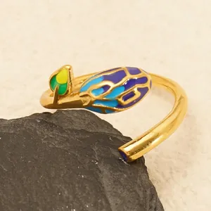 18K gold-plated stainless steel open ring featuring green leaf and purple flower bud enamel