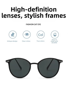 Detail of fashion cat eye sunglasses with silver metal accents and polarized lenses