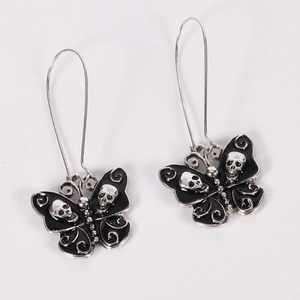 Gothic style silver skull and butterfly drop earrings with black enamel finish