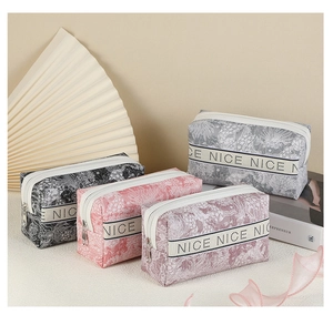 Detailed view of PVC waterproof cosmetic bags with woven straps in four elegant colors