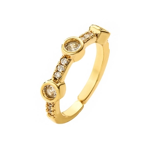 Golden eternity ring with white round cubic zirconia in a 45-degree angle view