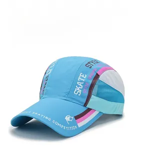 Detail of blue quick-dry cap showing side mesh panels and Skate Style graphic prints