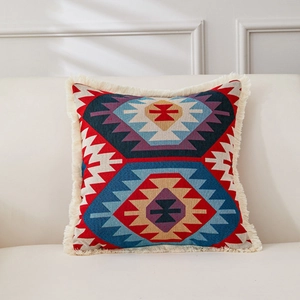 Amerikanischer Retro Kissenbezug aus Baumwolle Leinen mit geometrischem Jacquard und Fransen.