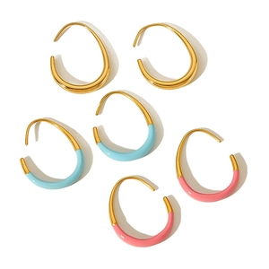 Three pairs of 18k gold plated C-shaped drop earrings in gold, blue, and pink enamel