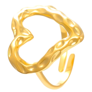Detailed close-up of the hammered texture on this gold irregular heart open ring