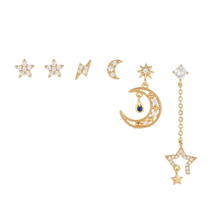 Macro detail of a 6-piece celestial earring set with gold plating and zircons