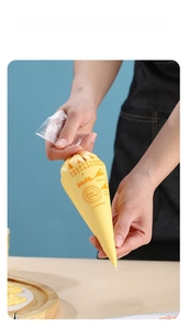 Food-grade disposable piping bag with Happy Birthday print and yellow cream filling