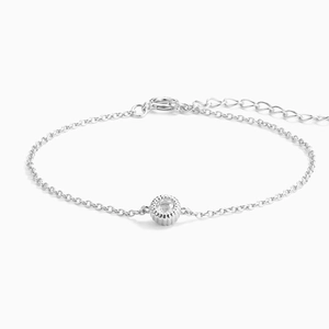Close-up of S925 sterling silver chain with a round zircon stone and lobster clasp