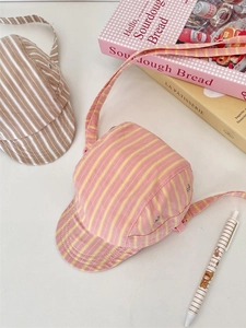 Pink and yellow striped hat-shaped crossbody canvas bag with matching baseball cap