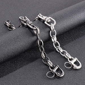 Detail of vintage silver titanium steel chain bracelet with heavy duty swivel clasps
