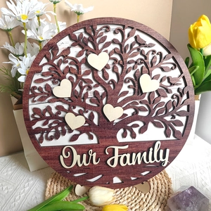 Detail of wooden family tree plaque with heart charms and Our Family engraving