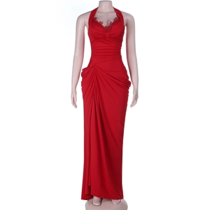 Detail of red halter dress featuring delicate lace trim and elegant pleated fabric texture