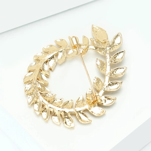 Golden olive leaf wreath brooch with sparkling rhinestones for elegant suit accessories